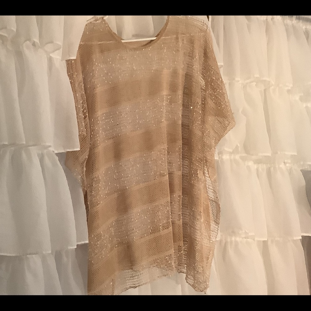Almost like poncho needs to be used over Cami